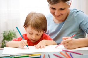 Mother and child drawing together